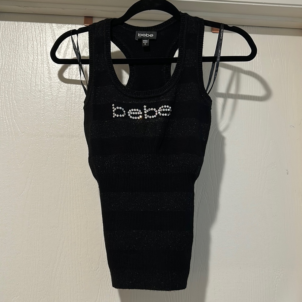 Ladies black and silver Racerback tank top with Bebe logo
